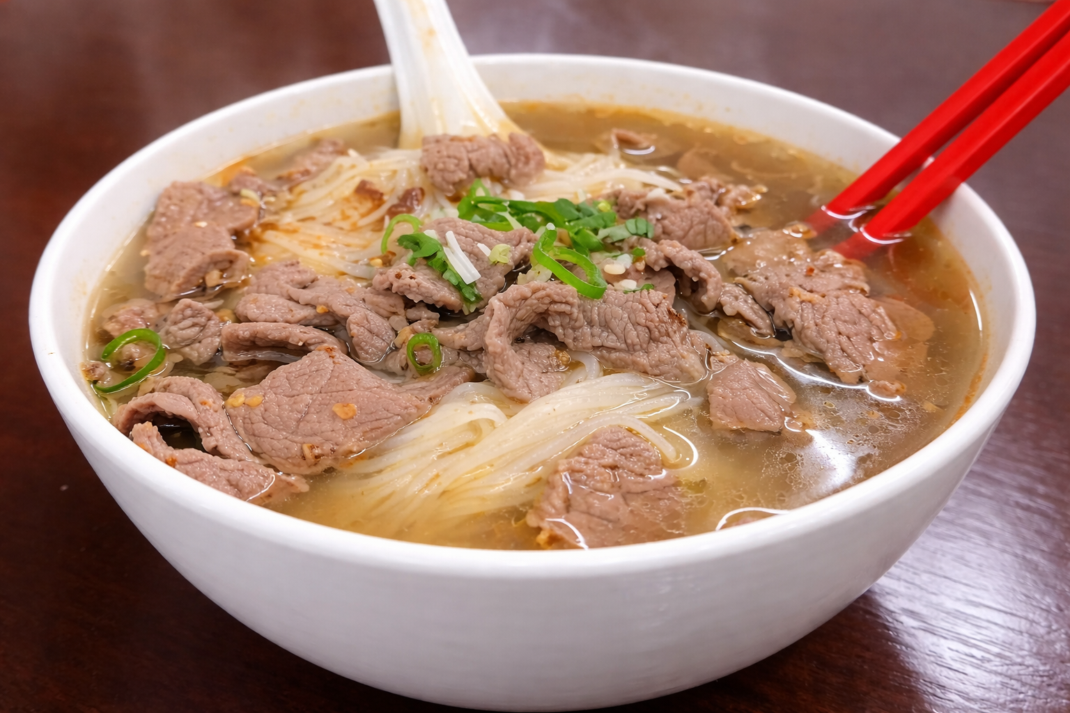 Cambodian noodle soup Kua Teaw with rice noodles and crispy garlic in Dunedin